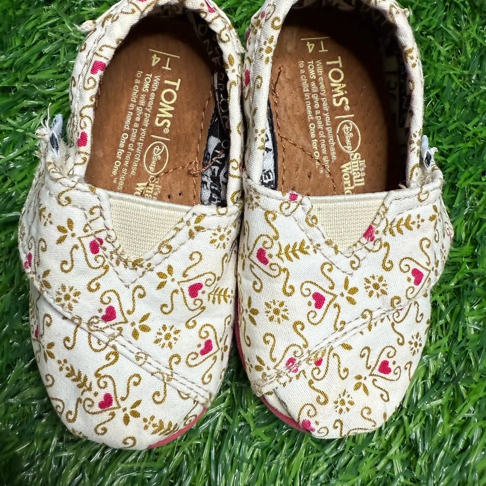 TOMS Kids Moccasins - Cream with Pink and Gold Floral Disneys it’s small world